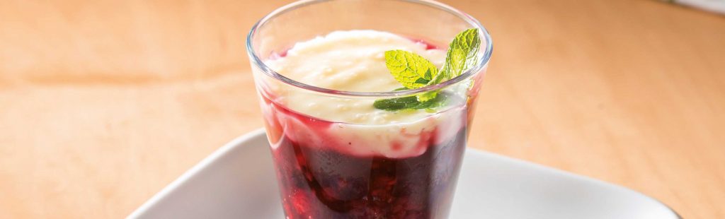 Berry compote with vanilla sauce
